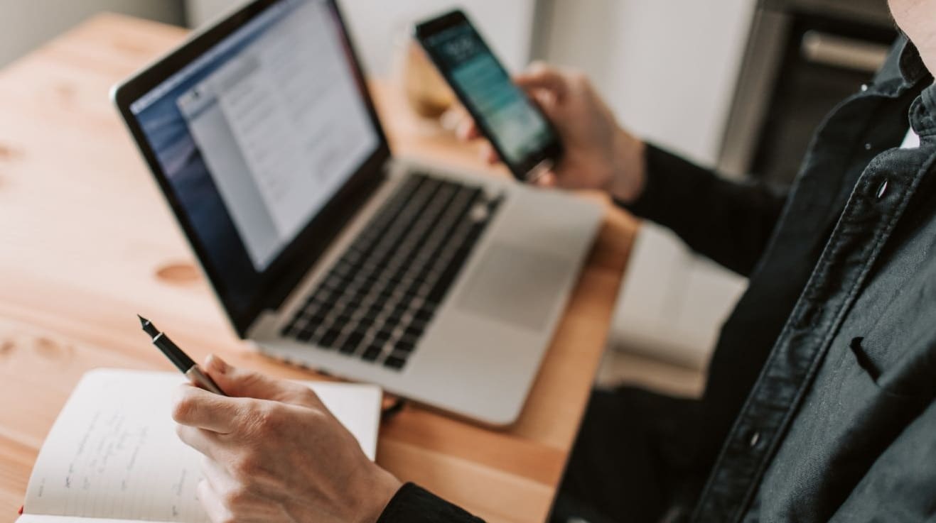 small business owner reviewing financial planning and calendar preparing for Super changes